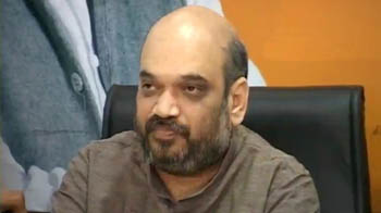 Amit Shah surfaces, says he is innocent