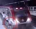Video : For fame, man films jump onto train track