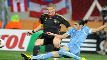 Germany edge Uruguay to claim third place