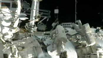 Russian astronauts on the ISS undertake spacewalk
