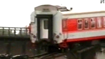 China train falls in river after bridge collapse