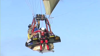 Swiss stuntman shows off his wings in sky jump