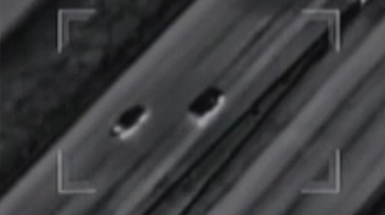 Murder suspect drives into police car