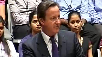 Cameron begins high octave India visit
