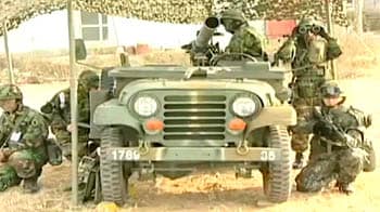 Video : South Korea puts off artillery drill