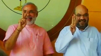 Double blow for Modi's aide