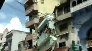 Seven-storey building collapses, no one injured