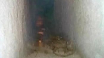 Video : Thieves dig 100-foot tunnel into bank