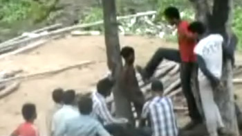 MMS shows child tied to tree, stripped, tortured