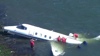 Executive jet skids off runway into sea