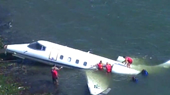 Executive jet skids off runway into sea