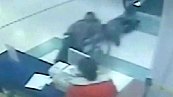 Wheelchair flung from travelator