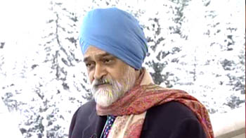 Cancel improper 2G licences: Montek at Davos