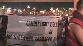 Karmapa supporters hold candle-light meet