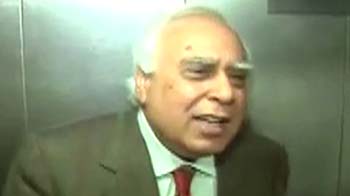 Direct all questions to CBI: Sibal on Raja's arrest