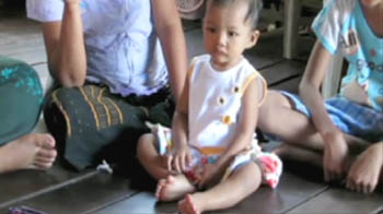 She has 12 fingers, 14 toes!