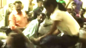 Video : BJP youth workers thrash professor with sandals