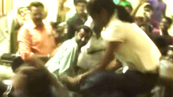 BJP youth workers thrash professor with sandals