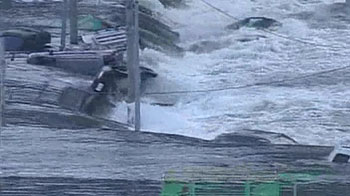 Japan: 13-foot tsunami hits northern coastline