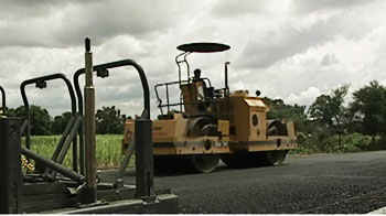 Govt slashes road building target