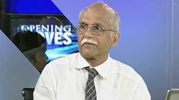 Should investors buy Tata Motors and Cairn India?