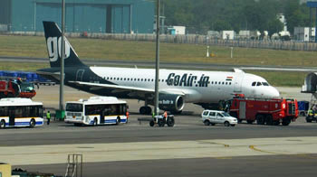 Plane returns to Delhi airport after fire