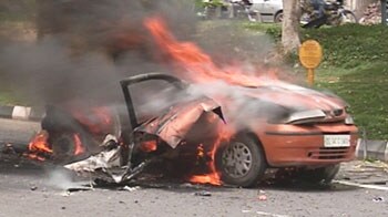 Video : Car bursts into flames on Delhi road