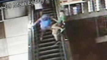Caught on camera: Drunk teenager falls 20 feet from escalator