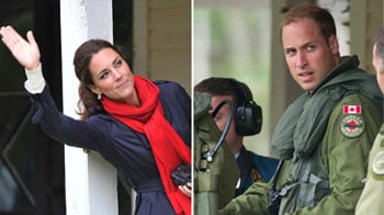Kate takes photos as William lands on water