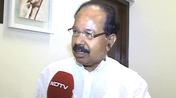 Was removed because of vested interests, says Moily