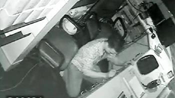 Caught on camera: Thief disables CCTV, steals 60,000, then naps