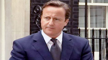 David Cameron promises action against rioters David Cameron promises action against rioters
