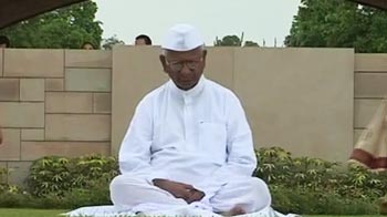 Denied permission for fast, Anna prays at Rajghat