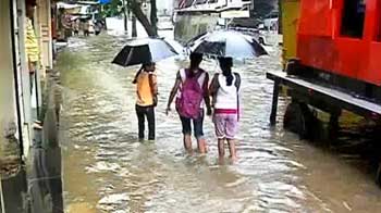 Rain chaos in Mumbai, trains hit