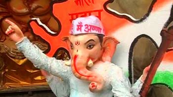 Ganpatis wear Anna topi