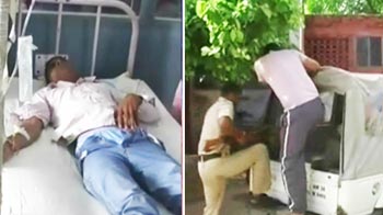 Haryana ex-minister looks on as sons open fire