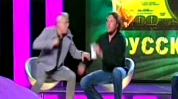 Russian tycoon punches billionaire on TV
