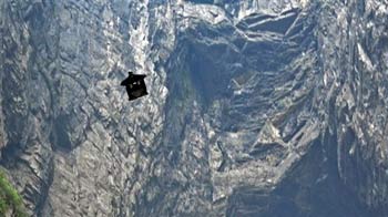 Man flies through a mountain in China Man flies through a mountain in China