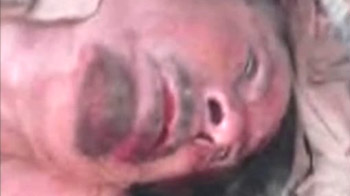 Cellphone video claiming to show Gaddafi moments after his death