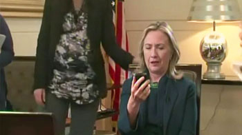 "Wow," said Hillary after watching Gaddafi report on BlackBerry