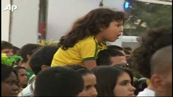 Jubilant Brazil fans in Rio celebrate first win