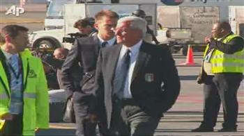 Italy arrive to defend World Cup title