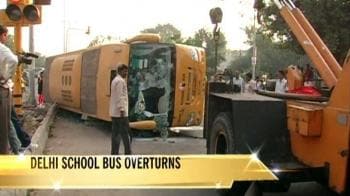 Video : Delhi school bus overturns; children safe