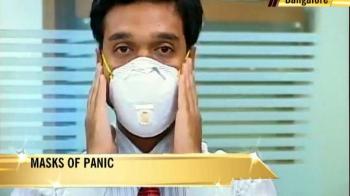 Swine flu: Masks of panic