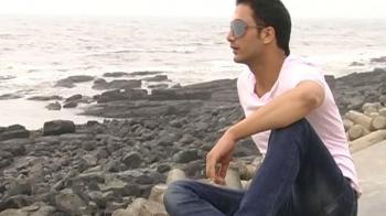 Branded a militant once, Dar now models with SRK