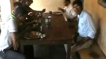 Doctors work together, but eat by caste