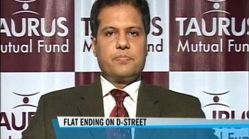 Sensex ends little changed, earnings eyed