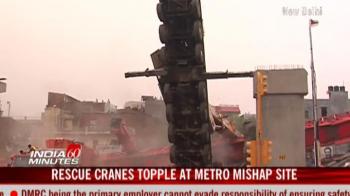 Rescue cranes topple at Metro mishap site