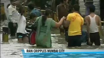 Rain cripples Mumbai