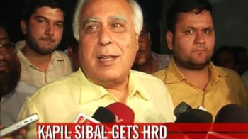 Portfolios announced; Kapil Sibal gets HRD